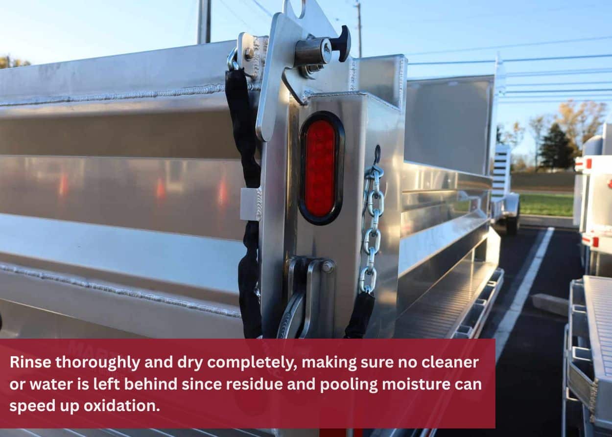 Close-up of aluminum truck bed latch and hardware, highlighting areas that collect grime and require careful cleaning